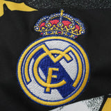 Camisa Real Madrid X Marvel Pré-Jogo 2026 Preta e Branca Edição Especial