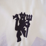 Conjunto Infantil Manchester United II 2025/26 Branco