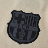 Conjunto Infantil Barcelona Away 2025/26 Dourado Nike